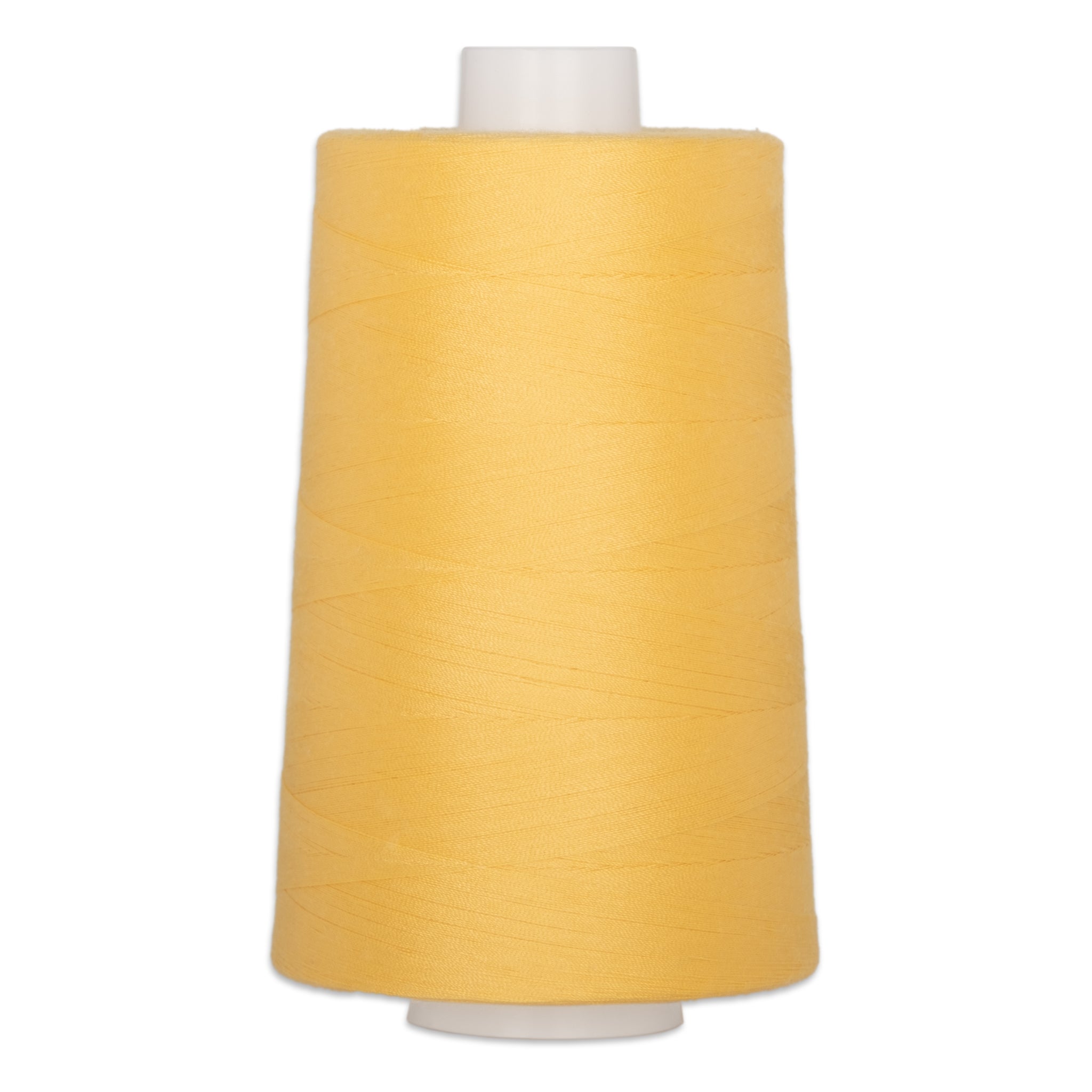 Large cone of golden yellow polyester quilting thread on white plastic spool