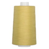 Yellow polyester quilting thread on white cone spool, 40 weight, 6000 yards