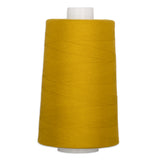 Yellow polyester quilting thread on white cone spool, 40 weight, 6000 yards