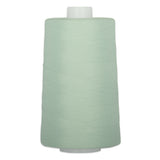 Light green polyester quilting thread on white cone spool, 6000 yards