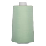 Large mint green polyester quilting thread cone on white plastic spool, 40 weight, 6000 yards.