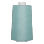 Light blue polyester quilting thread on white cone spool, 40 weight, 6000 yards