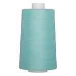Light blue polyester quilting thread on large white cone spool