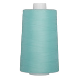 Light blue polyester quilting thread on large white cone spool