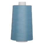 Light blue polyester quilting thread on white cone, 40 weight, 6000 yards