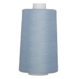 Light blue polyester quilting thread on white cone spool, 6000 yards