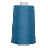 Blue polyester quilting thread on white cone, 40 weight, 6000 yards