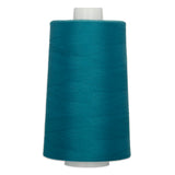 Teal polyester quilting thread on white cone spool, 40 weight, 6000 yards