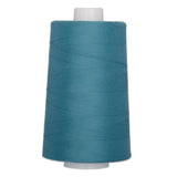 Blue polyester quilting thread on white cone, 40 weight, 6000 yards