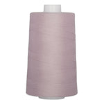 Lilac purple polyester quilting thread on large white cone spool