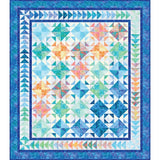 Colorful batik quilt with geometric star pattern in blues, teals, oranges and pinks with triangular border design.
