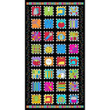Colorful quilting panel featuring 32 sewing-themed squares with scissors, thread, buttons, and sewing machines on black background with checkered borders.