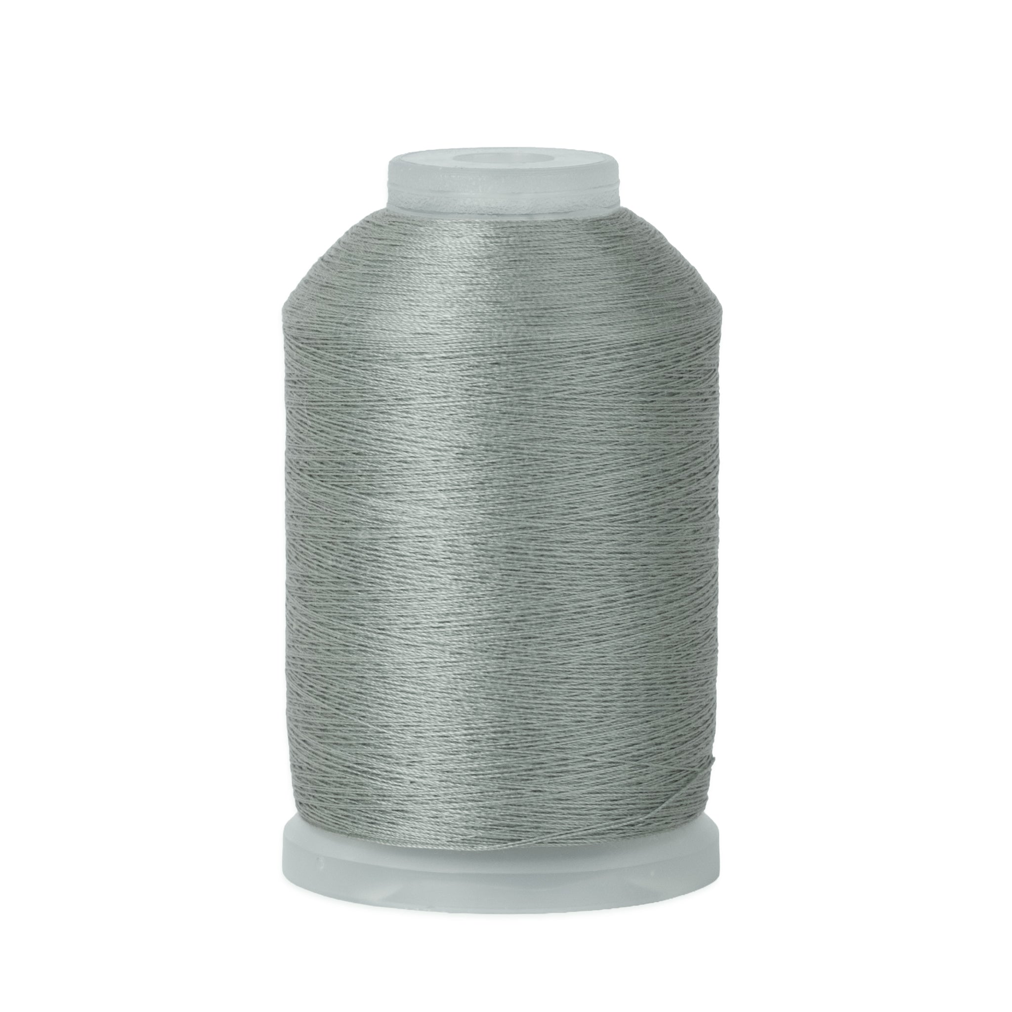 Spool of gray thread on a white background