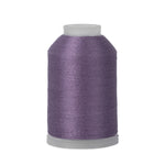 Spool of purple thread on a white background