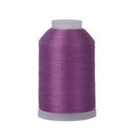 Spool of purple thread on a white background