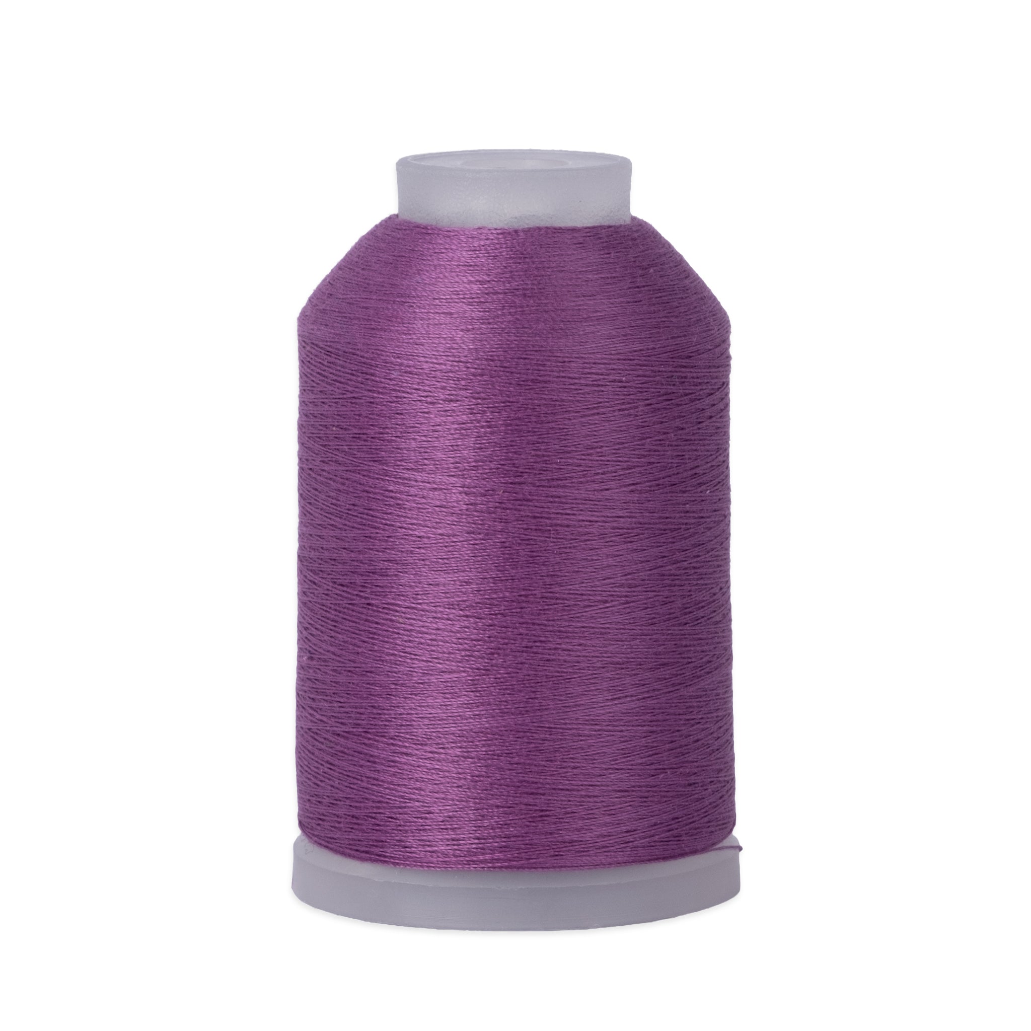 Spool of purple thread on a white background