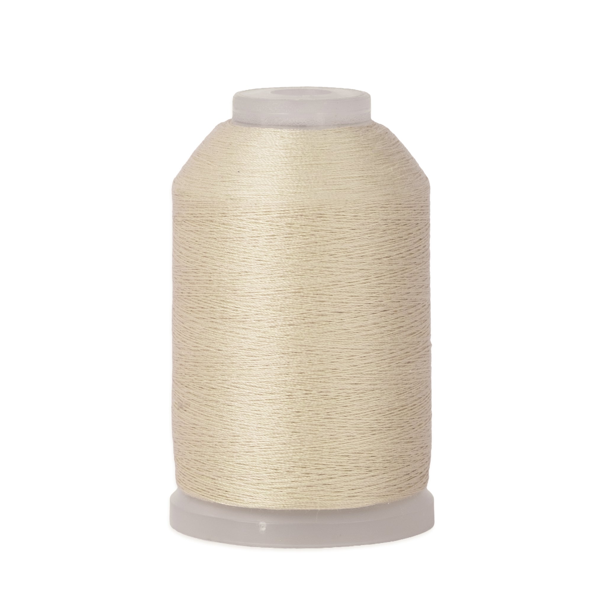 Spool of beige thread on a white background