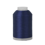 Spool of blue thread on a white background