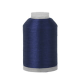 Spool of blue thread on a white background