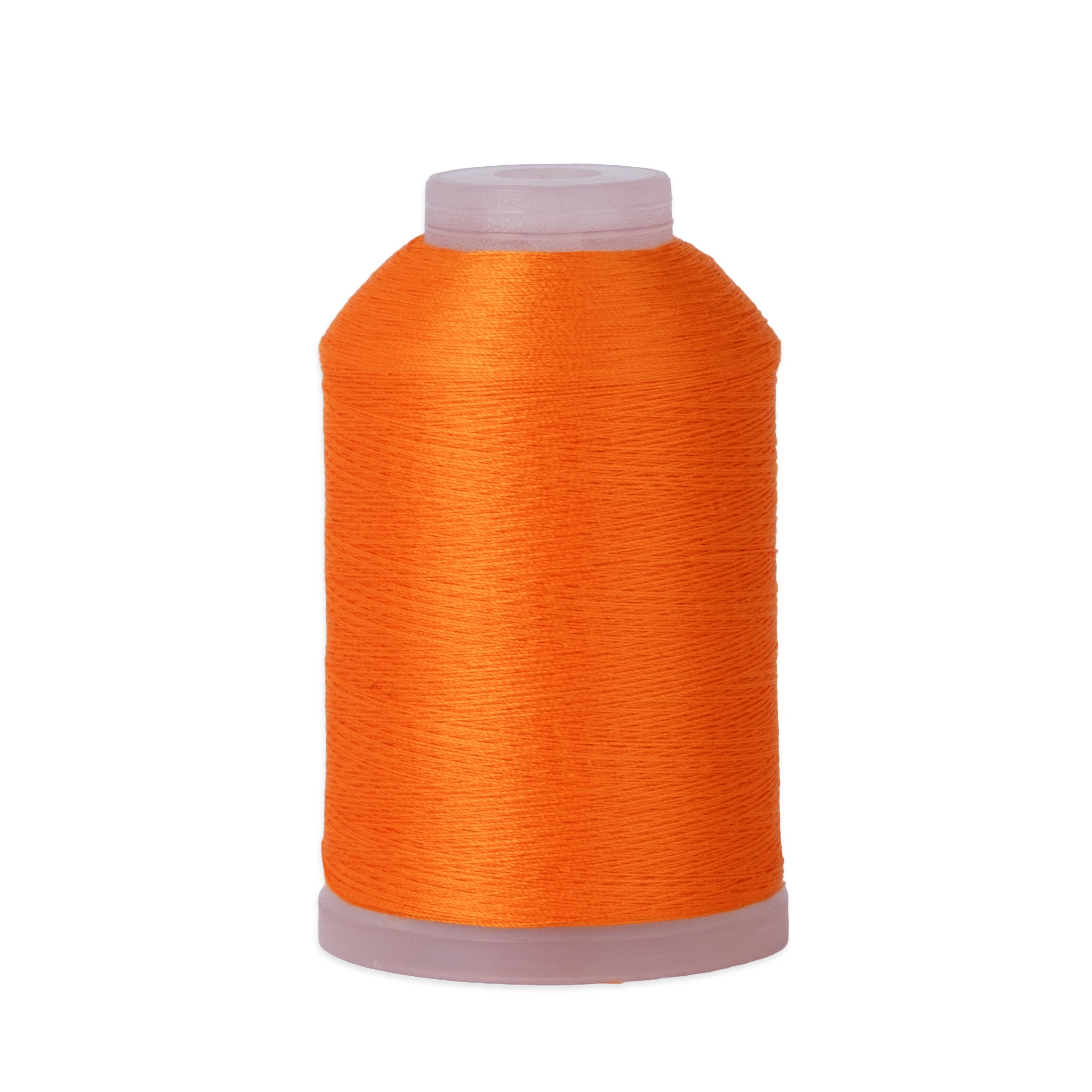 Spool of orange thread on a white background