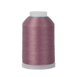 Spool of purple thread on a white background
