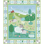 A quilted wall hanging featuring a pastoral farm scene with colorful sheep, rolling hills, and a red barn, framed by a decorative patchwork border in soft blues and greens.