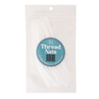 Packaged thread nets with a label on a white background