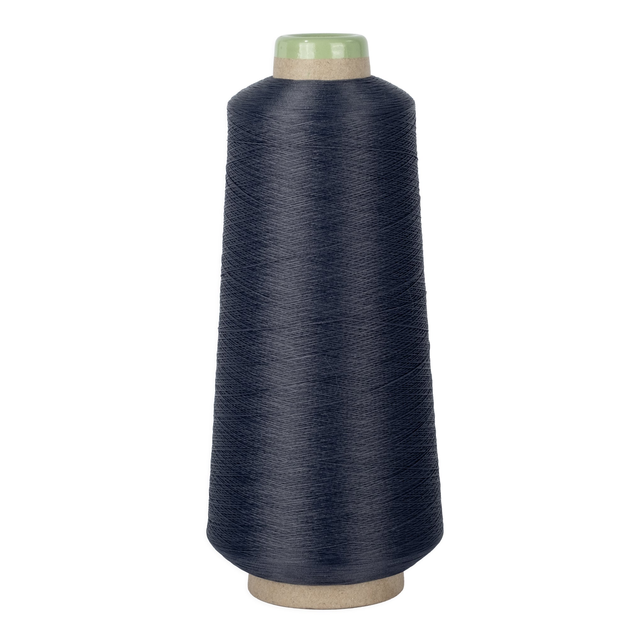 Large spool of dark blue thread on a white background